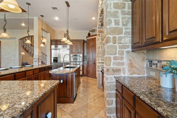 Interior, Kitchen, Pendant Lights, Recessed Lighting, Stainless Steel Appliances, Stone Walls