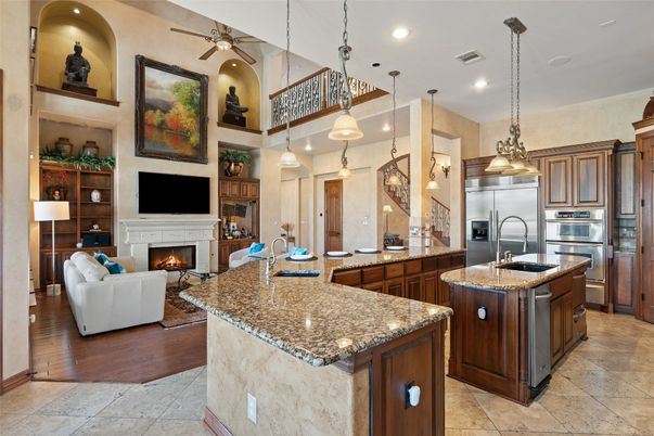Fireplace, Interior, Kitchen, Living room, Pendant Lights, Recessed Lighting, Stainless Steel Appliances, Wood Texture Flooring