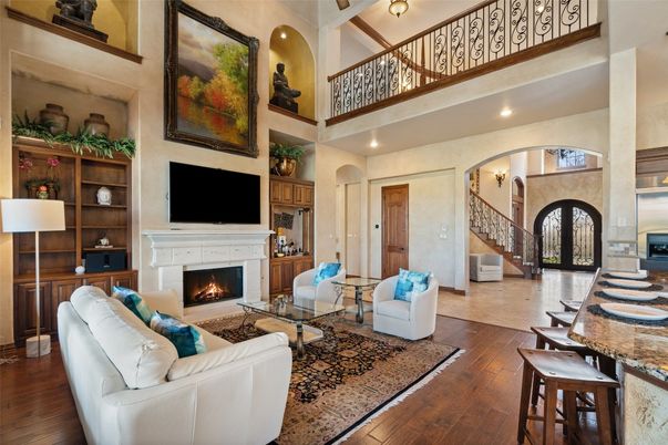 Dining room, Fireplace, Interior, Living room, Recessed Lighting, Wood Texture Flooring
