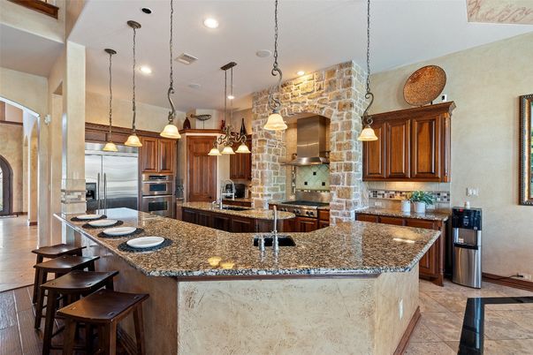 Interior, Kitchen, Pendant Lights, Recessed Lighting, Stainless Steel Appliances, Stone Walls