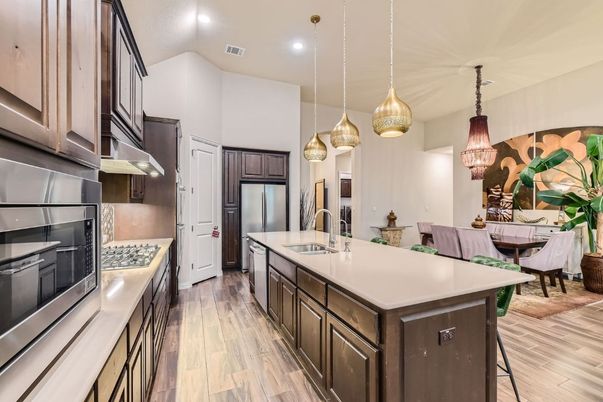 Dining room, Interior, Kitchen, Pendant Lights, Recessed Lighting, Stainless Steel Appliances, Wood Texture Flooring