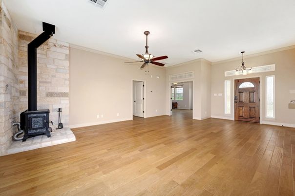 Empty room, Fireplace, Interior, Pendant Lights, Stone Walls, Wood Texture Flooring