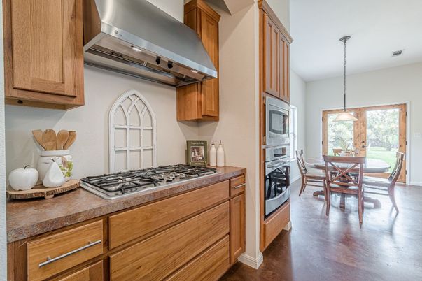 Dining room, Interior, Kitchen, Pendant Lights, Stainless Steel Appliances, Wood Texture Flooring