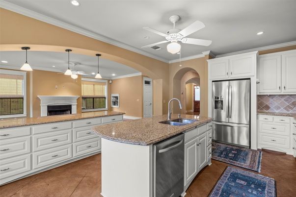 Fireplace, Interior, Kitchen, Pendant Lights, Recessed Lighting, Stainless Steel Appliances