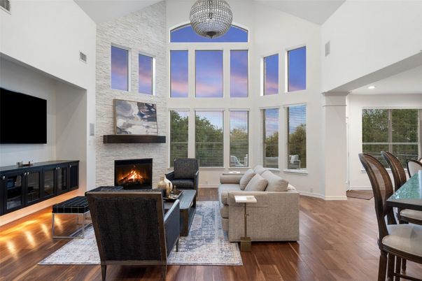 Fireplace, Interior, Living room, Recessed Lighting, Stone Walls, Wood Texture Flooring