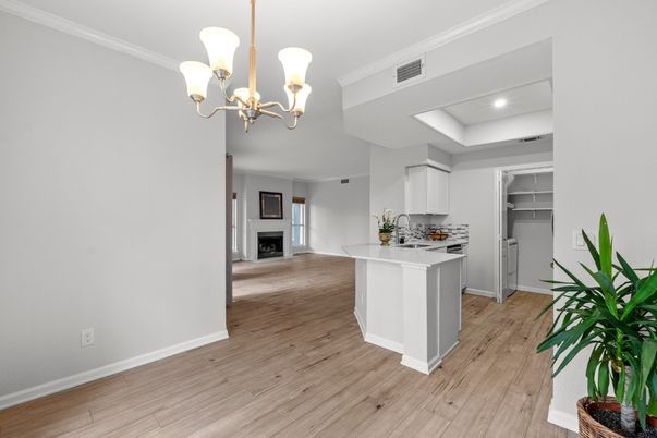 Chandelier, Fireplace, Interior, Kitchen, Recessed Lighting, Wood Texture Flooring