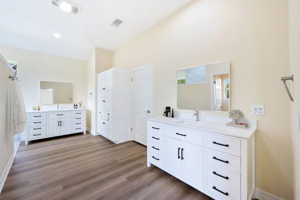 Bathroom, Dual Sink Vanities, Interior, Recessed Lighting, Wood Texture Flooring