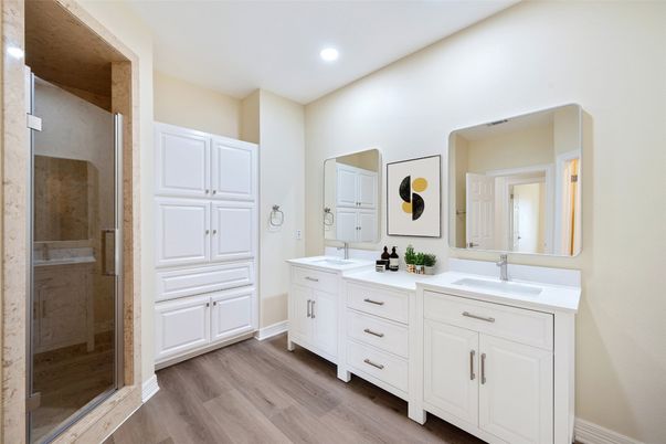 Bathroom, Dual Sink Vanities, Glass Shower, Interior, Recessed Lighting, Wood Texture Flooring