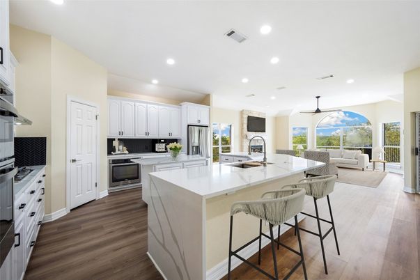 Interior, Kitchen, Living room, Recessed Lighting, Stainless Steel Appliances, Wood Texture Flooring