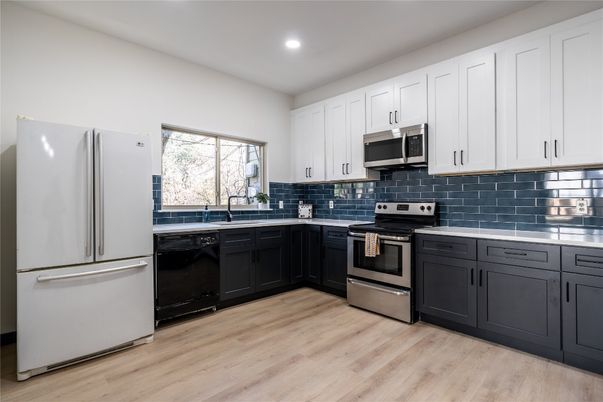 Interior, Kitchen, Recessed Lighting, Stainless Steel Appliances, Wood Texture Flooring
