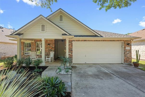 Attached, Exterior, Facade, Brick Facade, American Craftsman