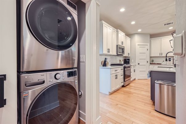 Interior, Kitchen, Recessed Lighting, Stainless Steel Appliances, Washer, Wood Texture Flooring