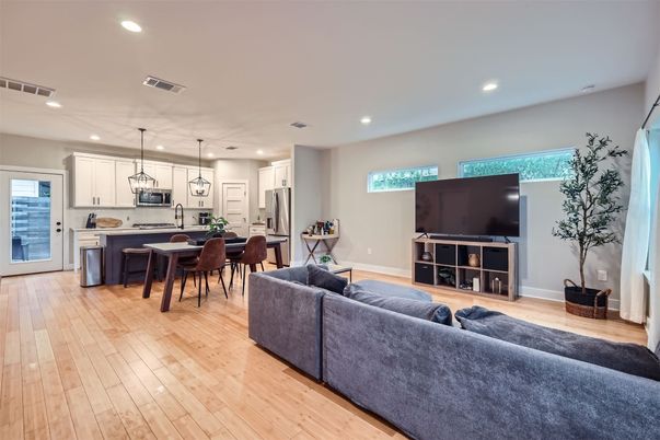 Dining room, Interior, Kitchen, Living room, Pendant Lights, Recessed Lighting, Stainless Steel Appliances, Wood Texture Flooring