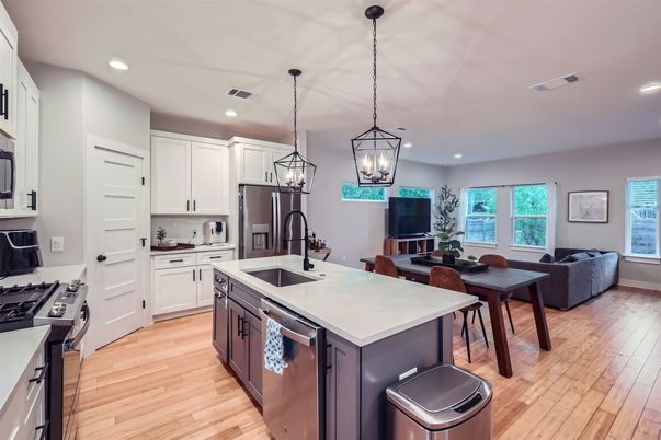 Dining room, Interior, Kitchen, Living room, Pendant Lights, Recessed Lighting, Stainless Steel Appliances, Wood Texture Flooring