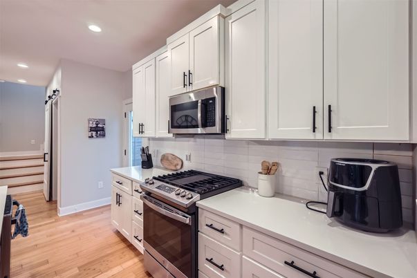 Interior, Kitchen, Recessed Lighting, Stainless Steel Appliances, Wood Texture Flooring