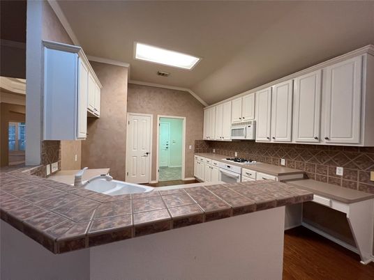 Interior, Kitchen, Tile Countertops, Wood Texture Flooring