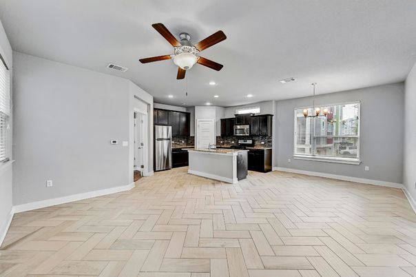 Chandelier, Empty room, Interior, Kitchen, Pendant Lights, Recessed Lighting, Stainless Steel Appliances, Wood Texture Flooring