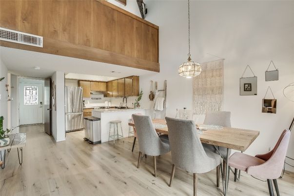 Dining room, Interior, Kitchen, Pendant Lights, Stainless Steel Appliances, Wood Texture Flooring