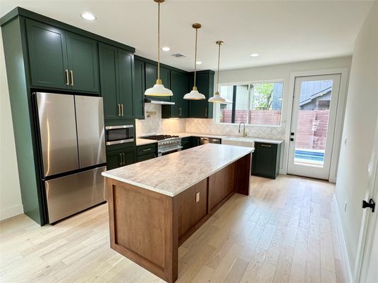Interior, Kitchen, Pendant Lights, Recessed Lighting, Stainless Steel Appliances, Wood Texture Flooring