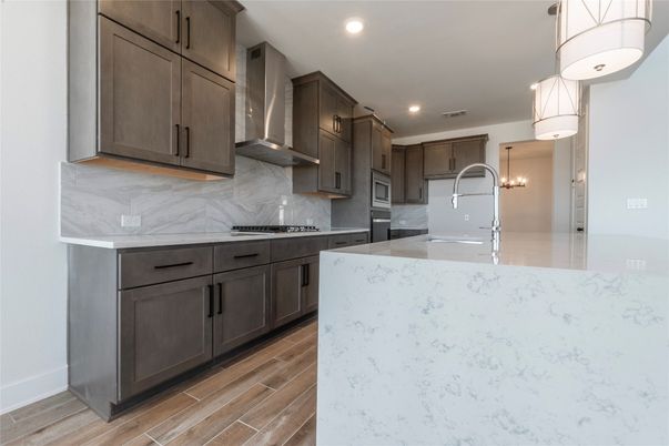 Interior, Kitchen, Marble Walls, Pendant Lights, Recessed Lighting, Wood Texture Flooring
