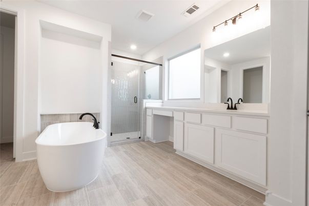Bathroom, Dual Sink Vanities, Free Standing Baths, Glass Shower, Interior, Recessed Lighting, Wood Texture Flooring