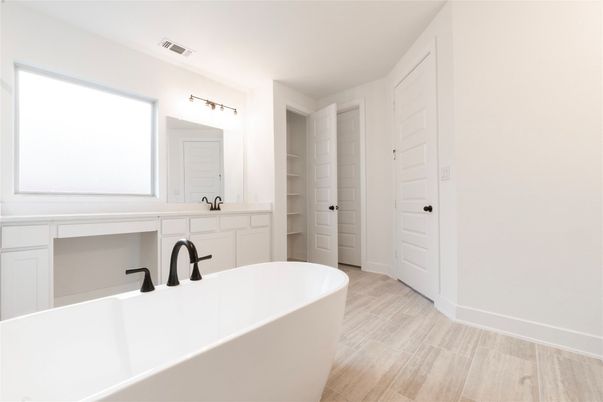 Bathroom, Dual Sink Vanities, Free Standing Baths, Interior, Wood Texture Flooring