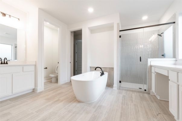 Bathroom, Dual Sink Vanities, Free Standing Baths, Glass Shower, Interior, Recessed Lighting, Wood Texture Flooring