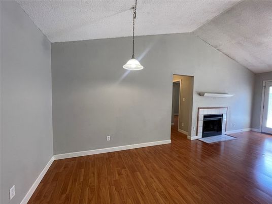 Empty room, Fireplace, Interior, Pendant Lights, Wood Texture Flooring