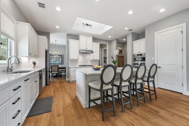 Chandelier, Dining room, Interior, Kitchen, Pendant Lights, Recessed Lighting, Stainless Steel Appliances, Wood Texture Flooring