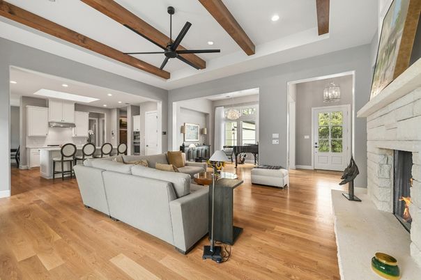 Fireplace, Interior, Kitchen, Living room, Pendant Lights, Recessed Lighting, Stainless Steel Appliances, Stone Walls, Wooden Beams, Wood Texture Flooring