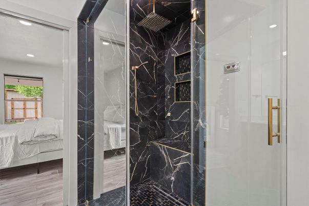 Bathroom, Bedroom, Glass Shower, Interior, Marble Walls, Recessed Lighting, Wood Texture Flooring