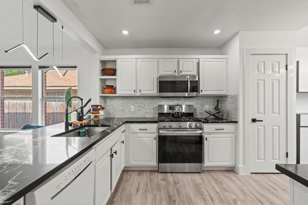 Interior, Kitchen, Pendant Lights, Recessed Lighting, Stainless Steel Appliances, Wood Texture Flooring