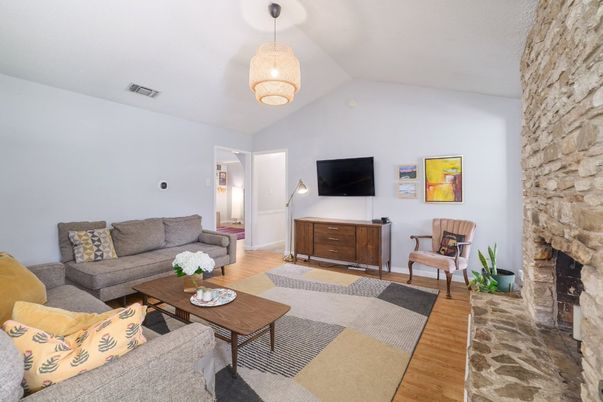Fireplace, Interior, Living room, Pendant Lights, Stone Walls, Wood Texture Flooring