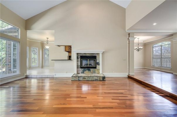 Chandelier, Empty room, Fireplace, Interior, Pendant Lights, Recessed Lighting, Wood Texture Flooring