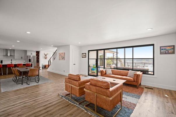 Dining room, Interior, Kitchen, Living room, Recessed Lighting, Water, Wood Texture Flooring