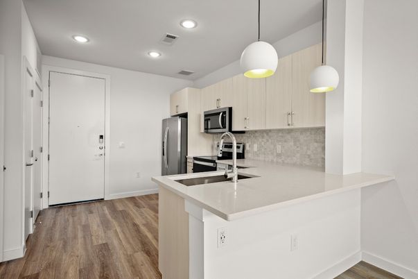 Interior, Kitchen, Pendant Lights, Recessed Lighting, Stainless Steel Appliances, Wood Texture Flooring