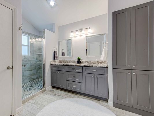 Bathroom, Dual Sink Vanities, Glass Shower, Interior, Recessed Lighting, Wood Texture Flooring