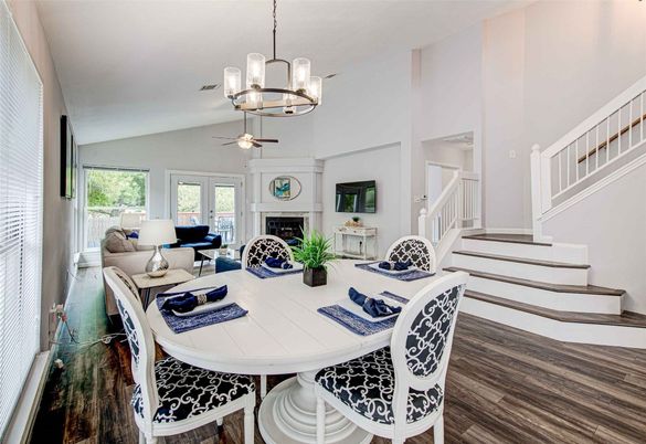 Chandelier, Dining room, Fireplace, Interior, Living room, Pendant Lights, Wood Texture Flooring