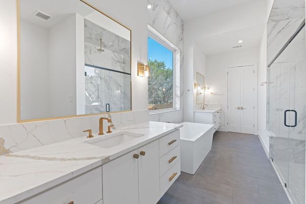 Bathroom, Dual Sink Vanities, Free Standing Baths, Glass Shower, Interior, Marble Walls, Recessed Lighting