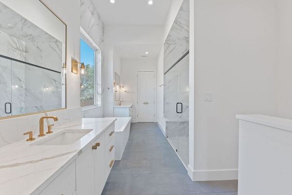 Bathroom, Dual Sink Vanities, Glass Shower, Interior, Marble Walls, Recessed Lighting