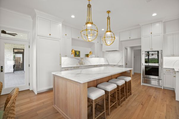 Interior, Kitchen, Marble Walls, Pendant Lights, Recessed Lighting, Stainless Steel Appliances, Wood Texture Flooring