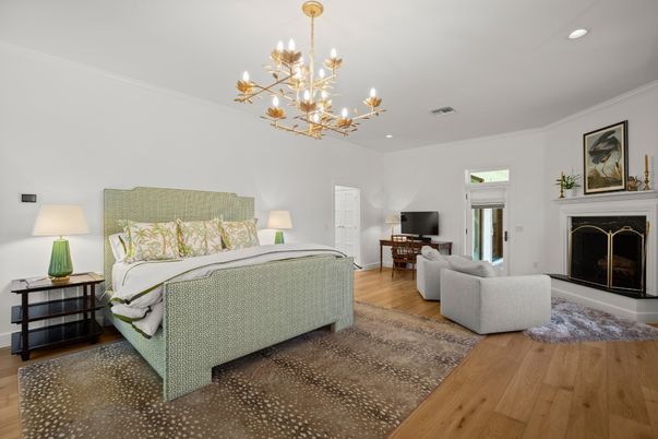 Bedroom, Chandelier, Fireplace, Interior, Recessed Lighting, Wood Texture Flooring