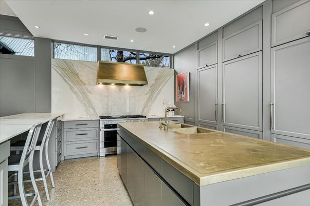 Interior, Kitchen, Marble Walls, Recessed Lighting, Stainless Steel Appliances