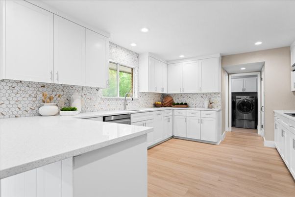 Interior, Kitchen, Recessed Lighting, Washer, Wood Texture Flooring