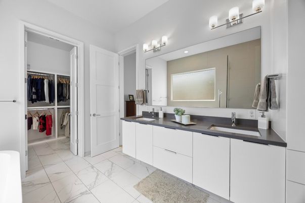Bathroom, Dual Sink Vanities, Interior, Marble, Recessed Lighting, Walk-in Closets