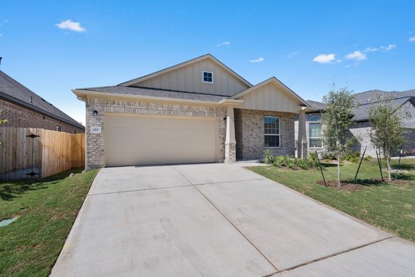 Attached, Exterior, Facade, Brick Facade, American Craftsman