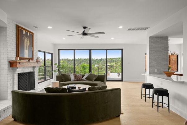 Fireplace, Interior, Living room, Recessed Lighting, Stone Walls, Wood Texture Flooring