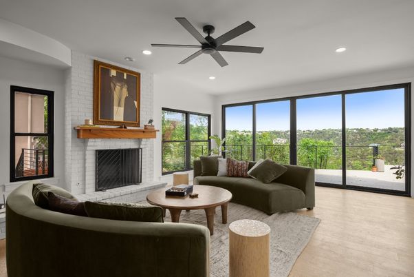 Fireplace, Interior, Living room, Recessed Lighting, Stone Walls, Wood Texture Flooring