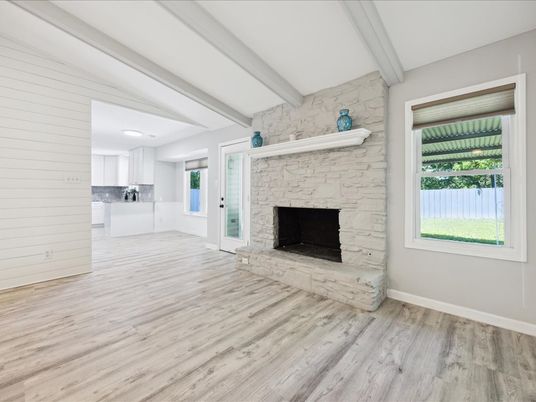 Empty room, Fireplace, Interior, Kitchen, Recessed Lighting, Stone Walls, Wood Texture Flooring
