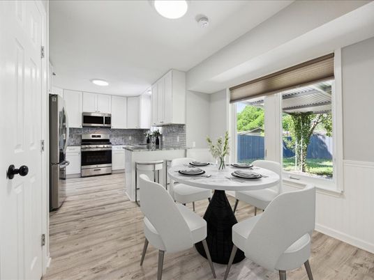 Dining room, Interior, Kitchen, Recessed Lighting, Stainless Steel Appliances, Wood Texture Flooring